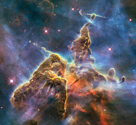 Photo Credit : (Pillars of Creation) NASA, ESA, and M. Livio and the Hubble 20th Anniversary Team (STScI)
